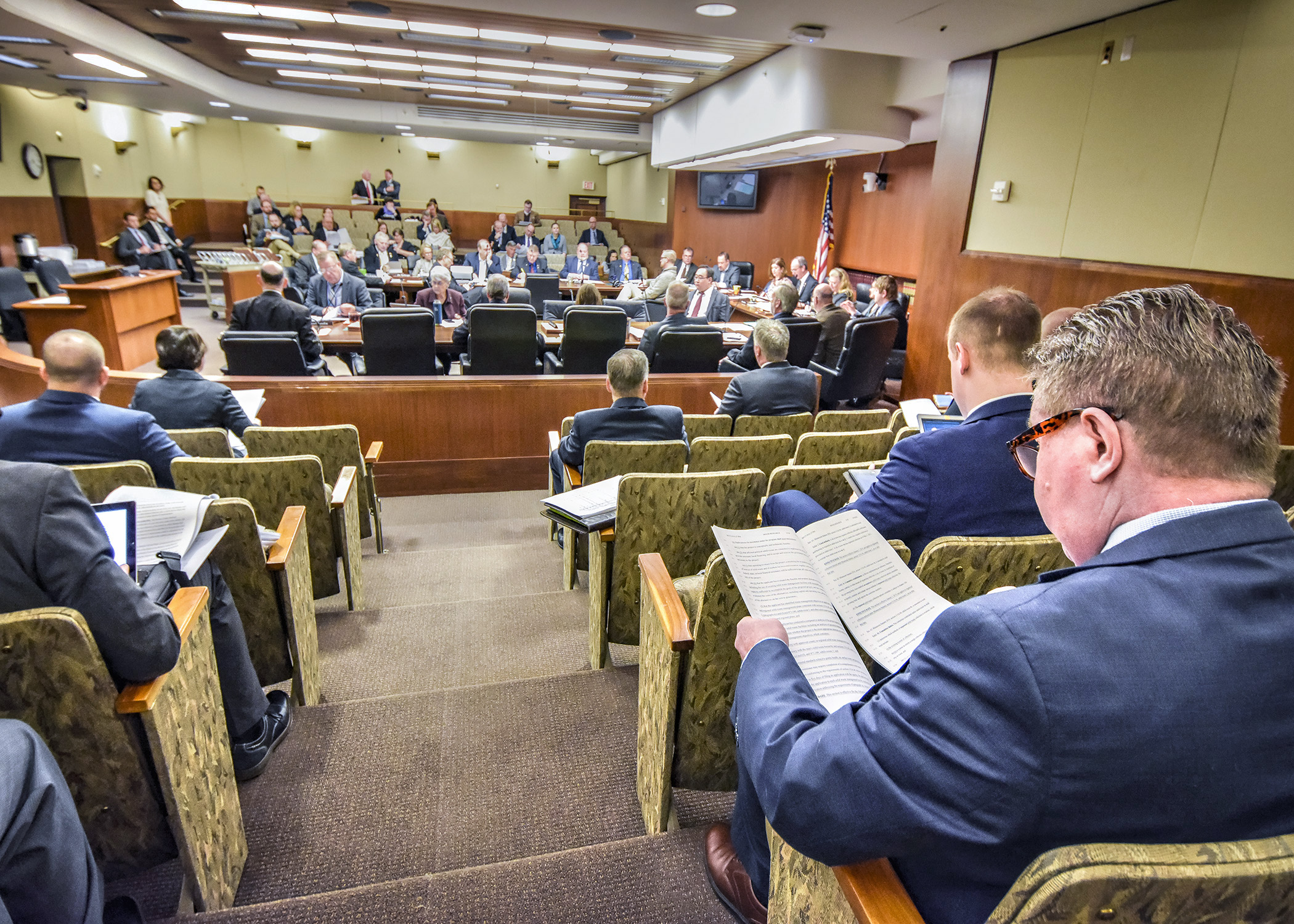 The House Environment and Natural Resources Policy and Finance Committee does a walk-through of the omnibus environment and natural resources finance bill April 18. A vote on the bill is expected Thursday. Photo by Andrew VonBank